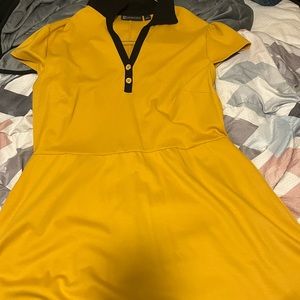 That style is a black and yellow t-shirt dress in the brand  New York Company